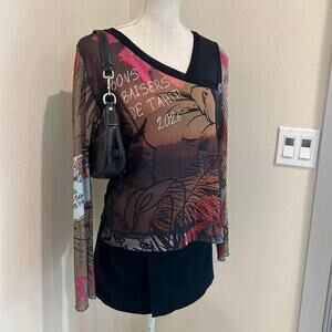 Made in France mucho mesh long sleeve top with unique print.
